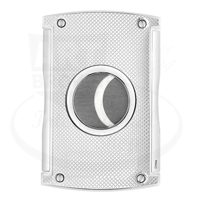 S.T. Dupont dual blade spring mechansim cigar cutter in chrome with gridline pattern, back side of cutter