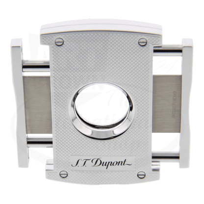 S.T. Dupont dual blade spring mechansim cigar cutter in chrome with gridline pattern with blades open viewed from an angle