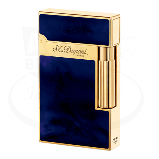 S.T. Dupont Atelier Line 2 lighter with dark blue lacquer and gold finish, seen from an angle.