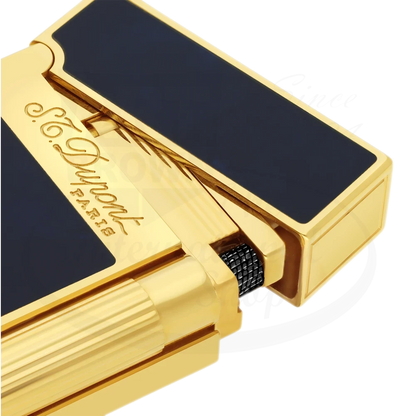 Close up of S.T. Dupont Atelier Line 2 lighter with dark blue lacquer and gold finish, showing detailed brand engraving.