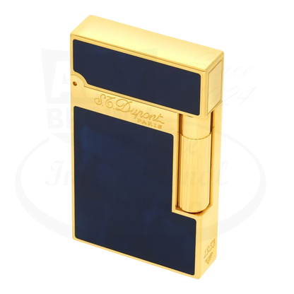 S.T. Dupont Atelier Line 2 lighter with dark blue lacquer and gold finish, seen from an angle with lid closed.