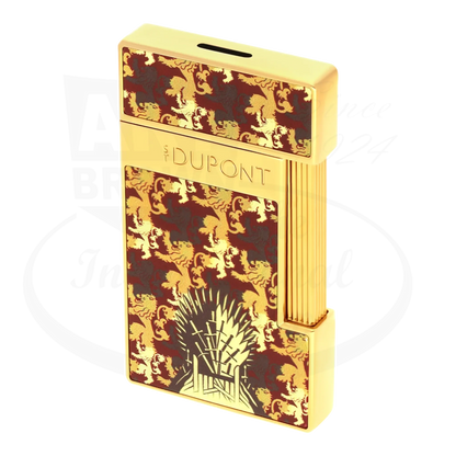 S.T. Dupont x Game of Thrones Slimmy torch lighter with red & gold lion motif, iron throne, and gold finish, seen from an angle.