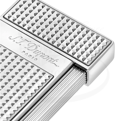 Corner of S.T. Dupont slimmy torch lighter diamond head pattern in chrome 