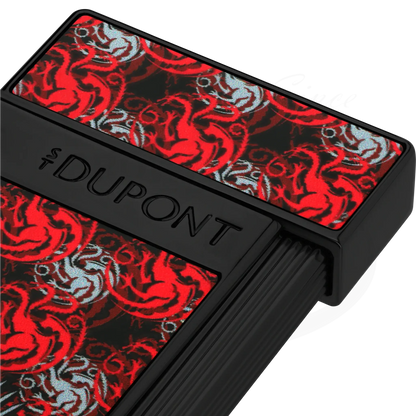 Close up of S.T. Dupont x Game of Thrones Slimmy torch lighter with red and white dragon motif.