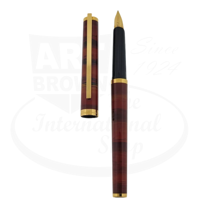 S.T. Dupont Classique fountain pen with Tigers Eye lacquer and gold trim, showing the pen and cap separated.