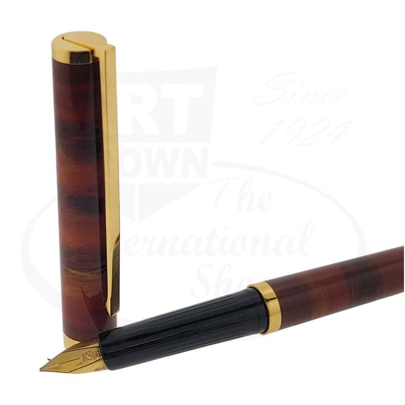 S.T. Dupont Classique Tigers Eye lacquer fountain pen with gold trim, cap off and nib exposed.