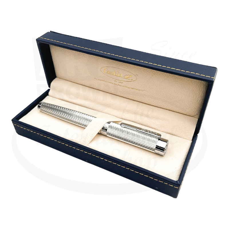 Conklin Signature Herringbone Pen in silver, elegantly presented in a blue and cream box.