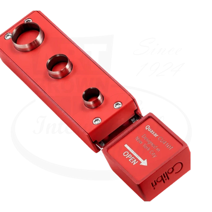 Colibri Quasar Cigar Punch in red, open to show the punch holes, designed in New York City.