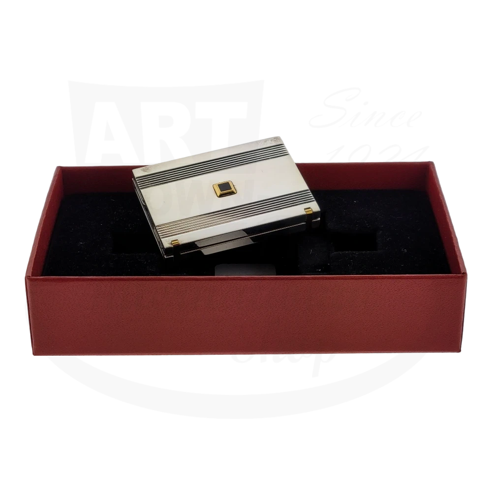 Vintage S.T. Dupont pocket photo holder in palladium with gold and lacquer accents. The holder is folded shut, sitting inside the gift box.