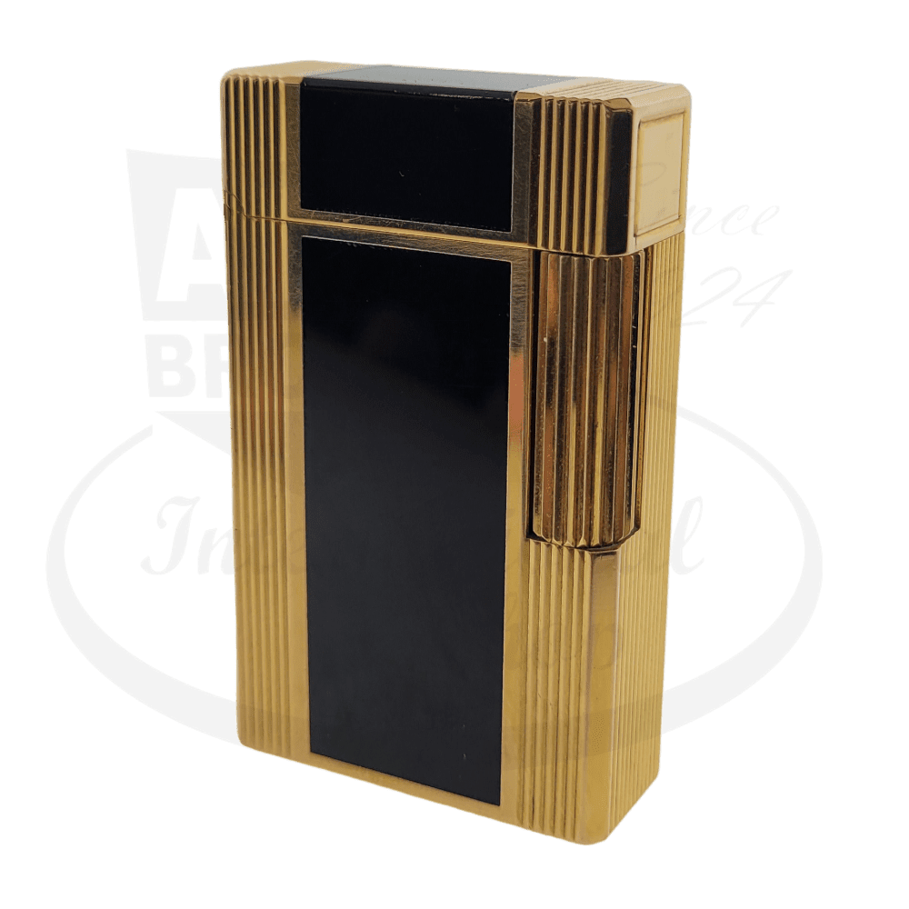 S.T. Dupont Ligne 1 tall luxury lighter in black lacquer and gold-plated brass, featuring vertical ridged details and classic rectangular form