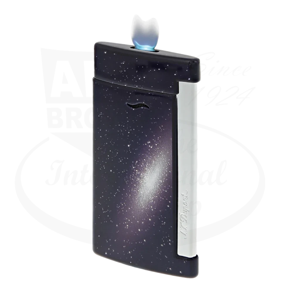 Blue Galaxy-themed S.T. Dupont Slim 7 lighter with a lit flame, showcasing a night sky inspired design with chrome finishes.